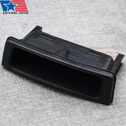 Lower center console storage - center,