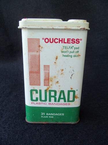 Vtg metal curad plastic - vtg,