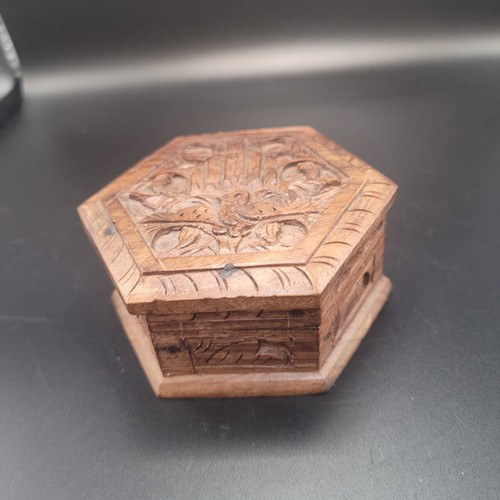 Hand carved teak wood hexagon - hand,