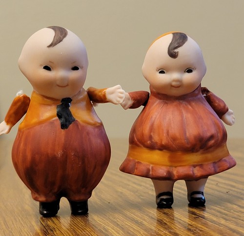 Pair happifats bisque - of,