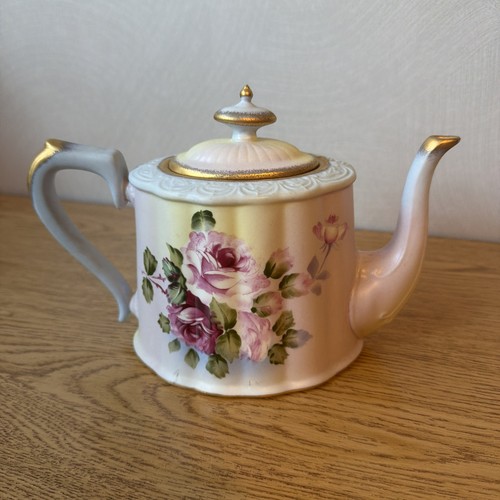 Burton teapot - &,