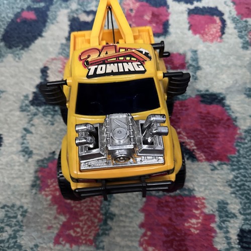 Large yellow tow truck toy - tow,