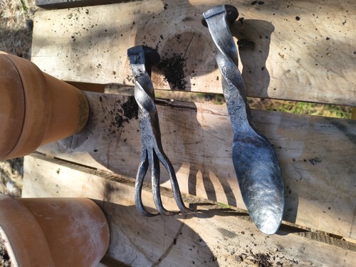 Hand forged from railroad - from,