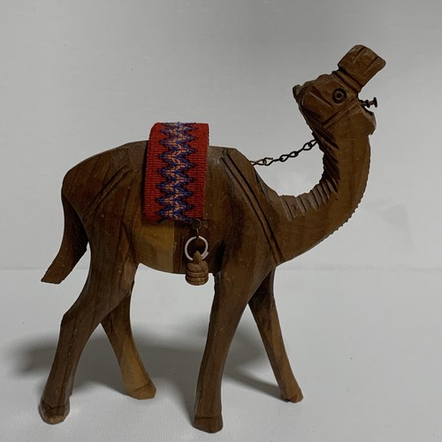 Hand carved wooden camel with - carved,