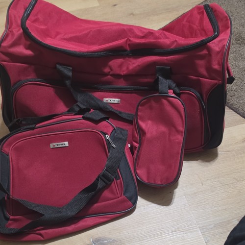 Tag piece red rolling duffel - tag,