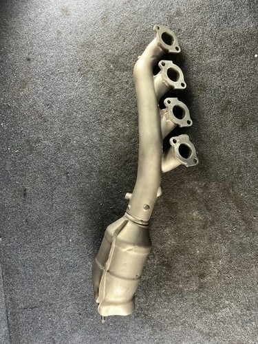 Nissan exhaust manifold oem - exhaust,