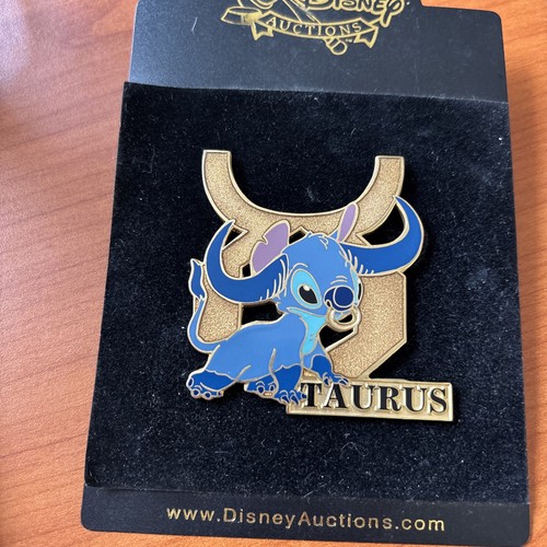 Disney auctions stitch zodiac - disney,