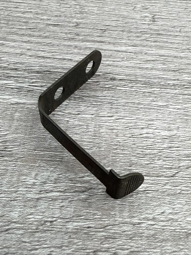 Mossberg magazine latch - magazine,