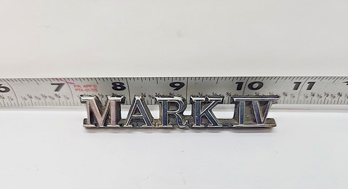 Oem trunk lid emblem - lid,