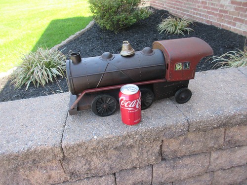 Old tin locomotive toy train - locomotive,