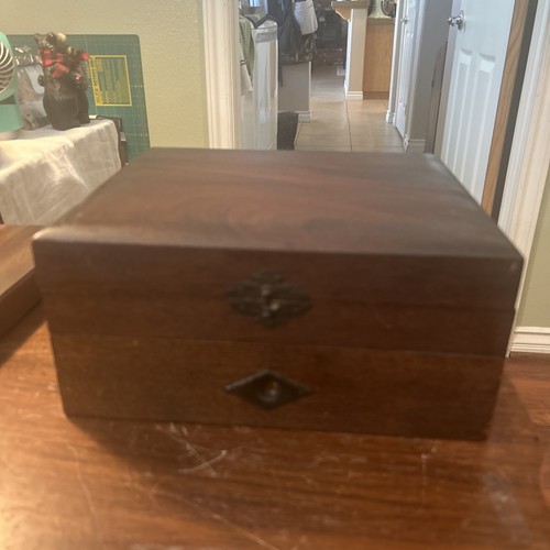 Vintage wooden box with ornate - with,