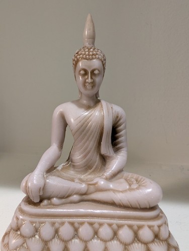 Carved stone buddha statue - carved,
