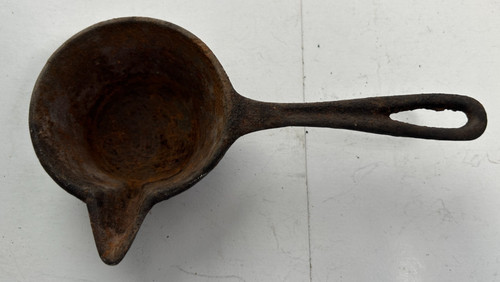 Vintage cast iron lead - cast, melting