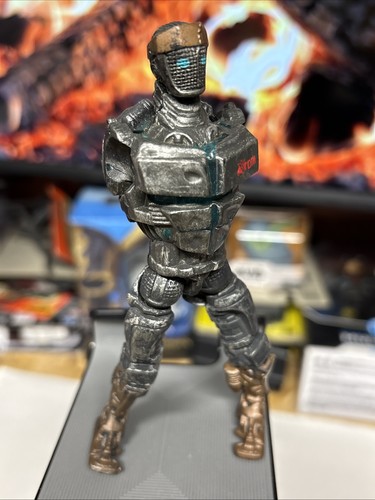 Rare real steel atom figure - real,