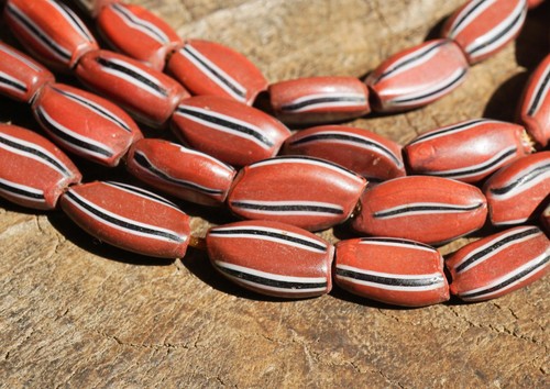 Mud red striped african beads - red,