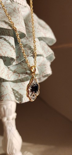 Gold tone black onyx pendant - tone,