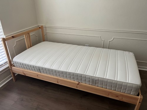 Two solid pine single beds