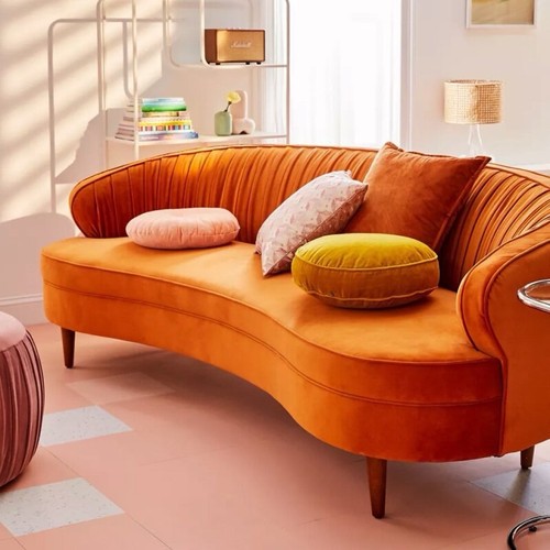Curved orange velvet sofa - curved,