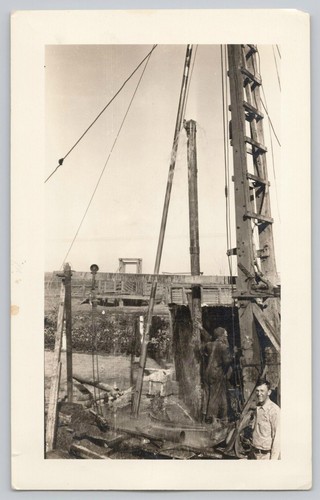1920s men working - working, pile