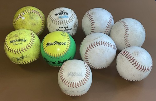 Lot used softballs for - 9,