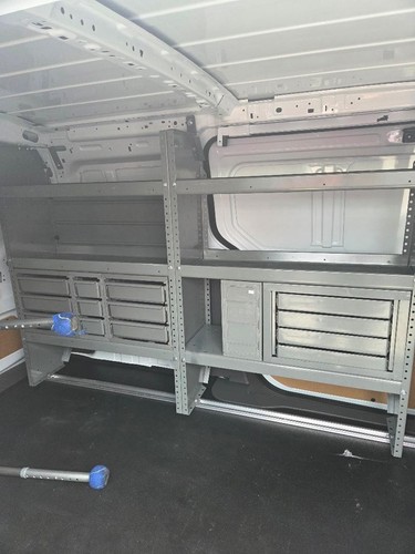 Metal shelving system for van
