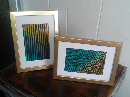 Small framed painting gold and - framed,