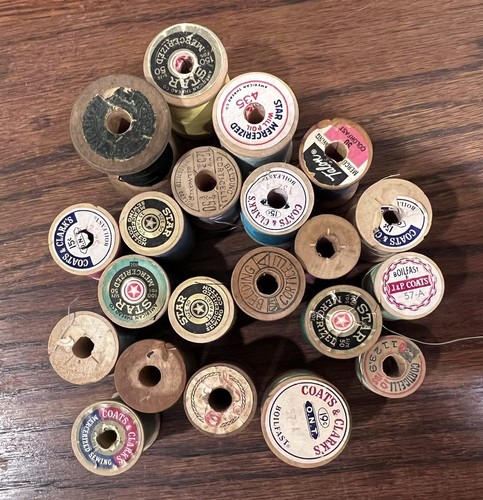 Old wooden thread spools - wooden,