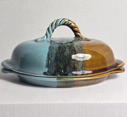 Hand thrown pottery butter - hand,