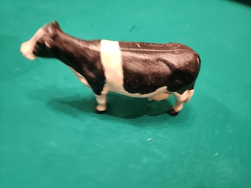 Vintage cast iron holstein - 6.",