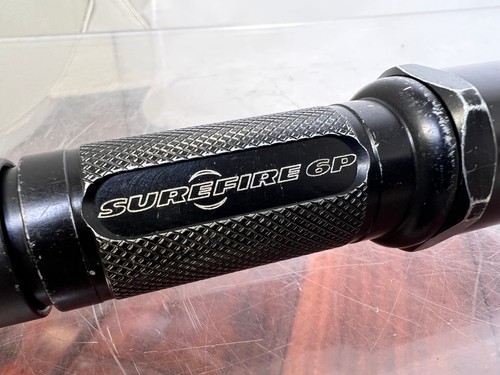 Surefire flashlight flash - flashlight,