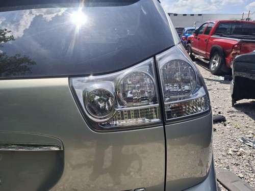 Used right tail light assembly - right,
