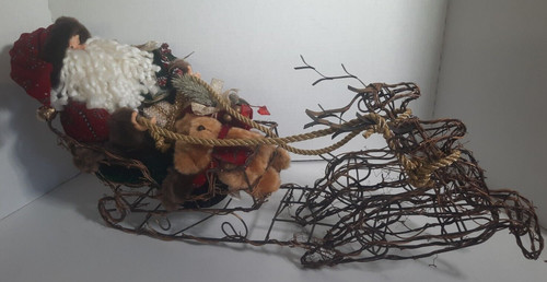 Santa clause with wire sleigh - clause,