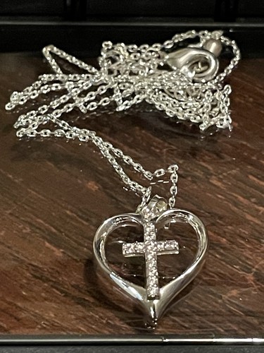 Women heart with - cross, in
