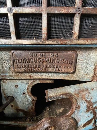 Antique wood stove under - wood,