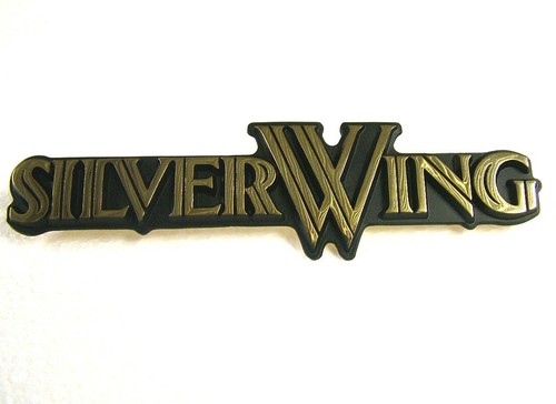 Silver wing side cover badge - cover,