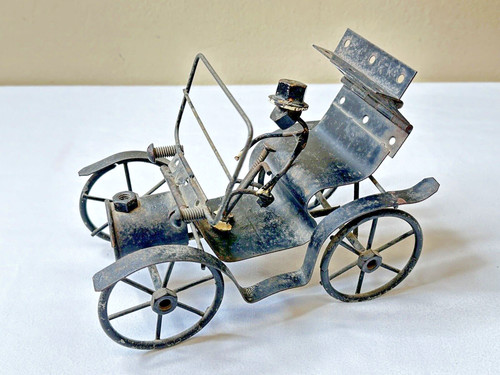 Vintage metal hand made car - hand,