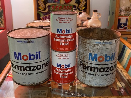 Old mobil motor oil - mobil, cans