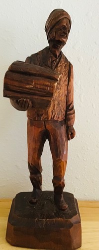 Wood carving caron man - by,