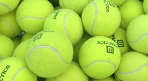 100 used tennis balls - used,