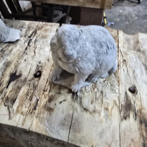 Hand made cement ground hog - hand,