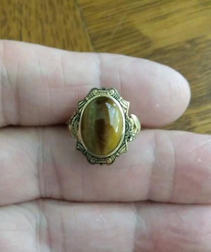 Antique woman tiger s - , eye