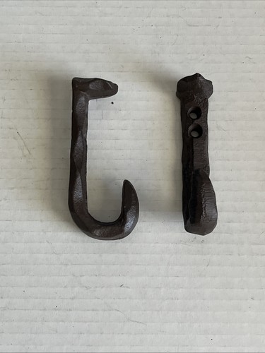 Bent railroad spike - spike, wall