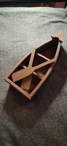 Small wooden half canoe with - small,