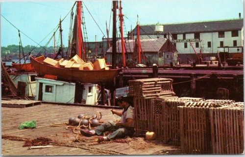 Fisherman mending nets - ,