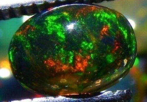 Ethiopian black fire opal x - 10,