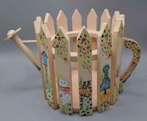 Wooden planter watering can