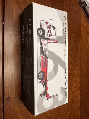 Tiny hino 300 flatbed tow - 1:64,