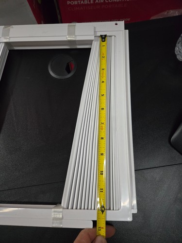 Window air conditioner side - window,