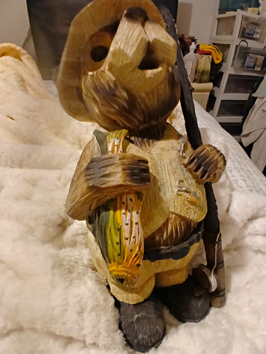 Carved wood bear figurine with - wood,