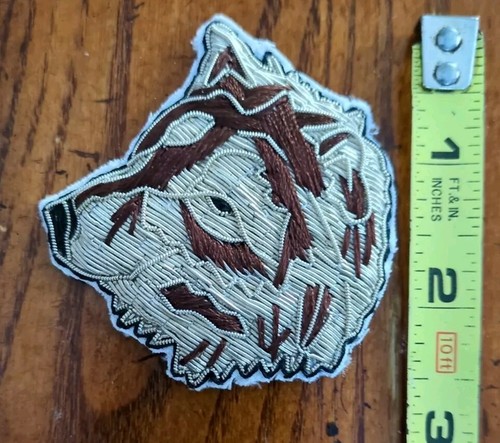 Wolf hand embroidered wire - hand,